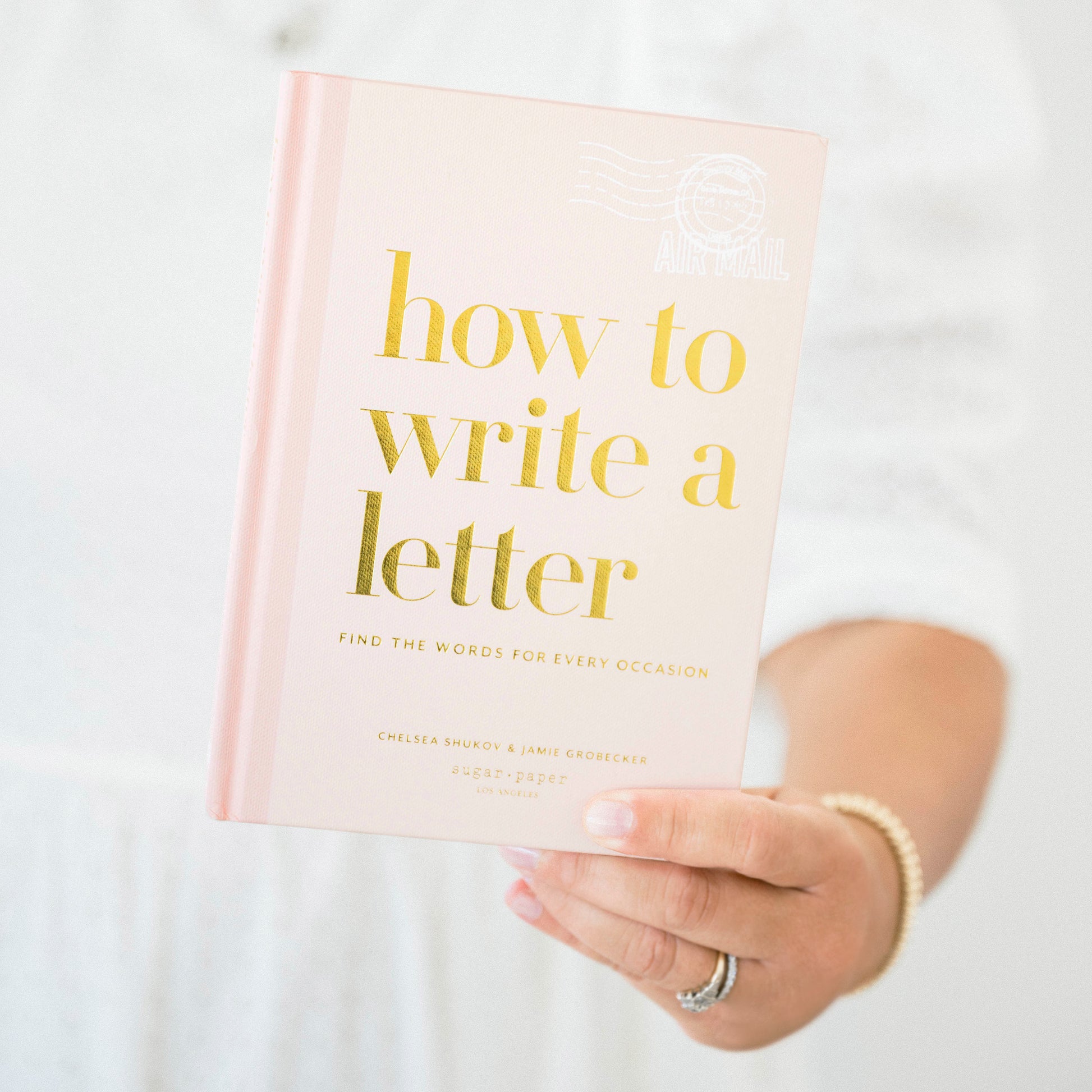 how to write a letter book in hand