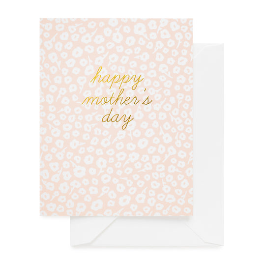 pink floral card with gold text, white envelope
