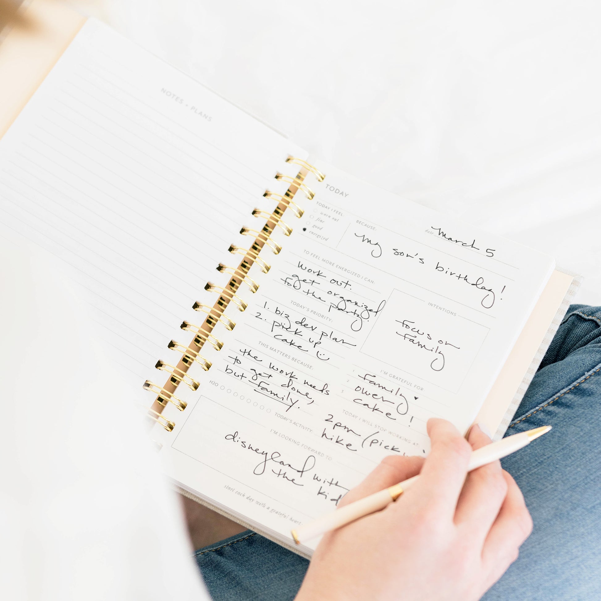 Interior page of mindful journal with woman writing