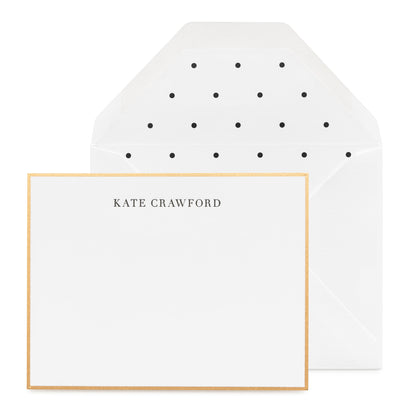 Black and white custom stationery with gold border and black polka dot liner