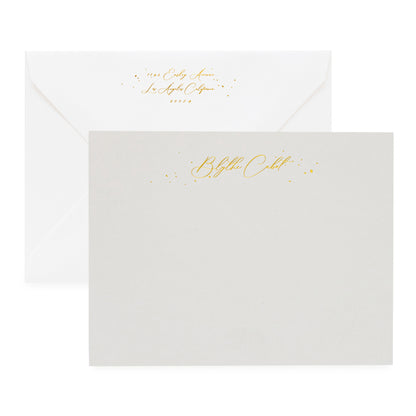 Grey stationery set with gold foil script name and gold return address detail