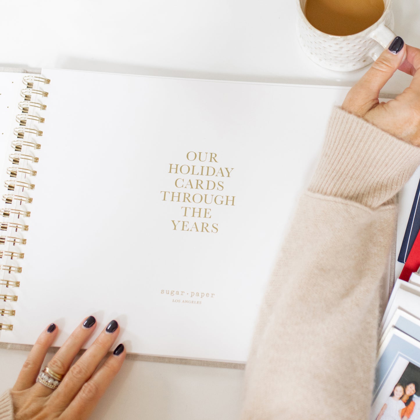 the holiday card book open to the first page