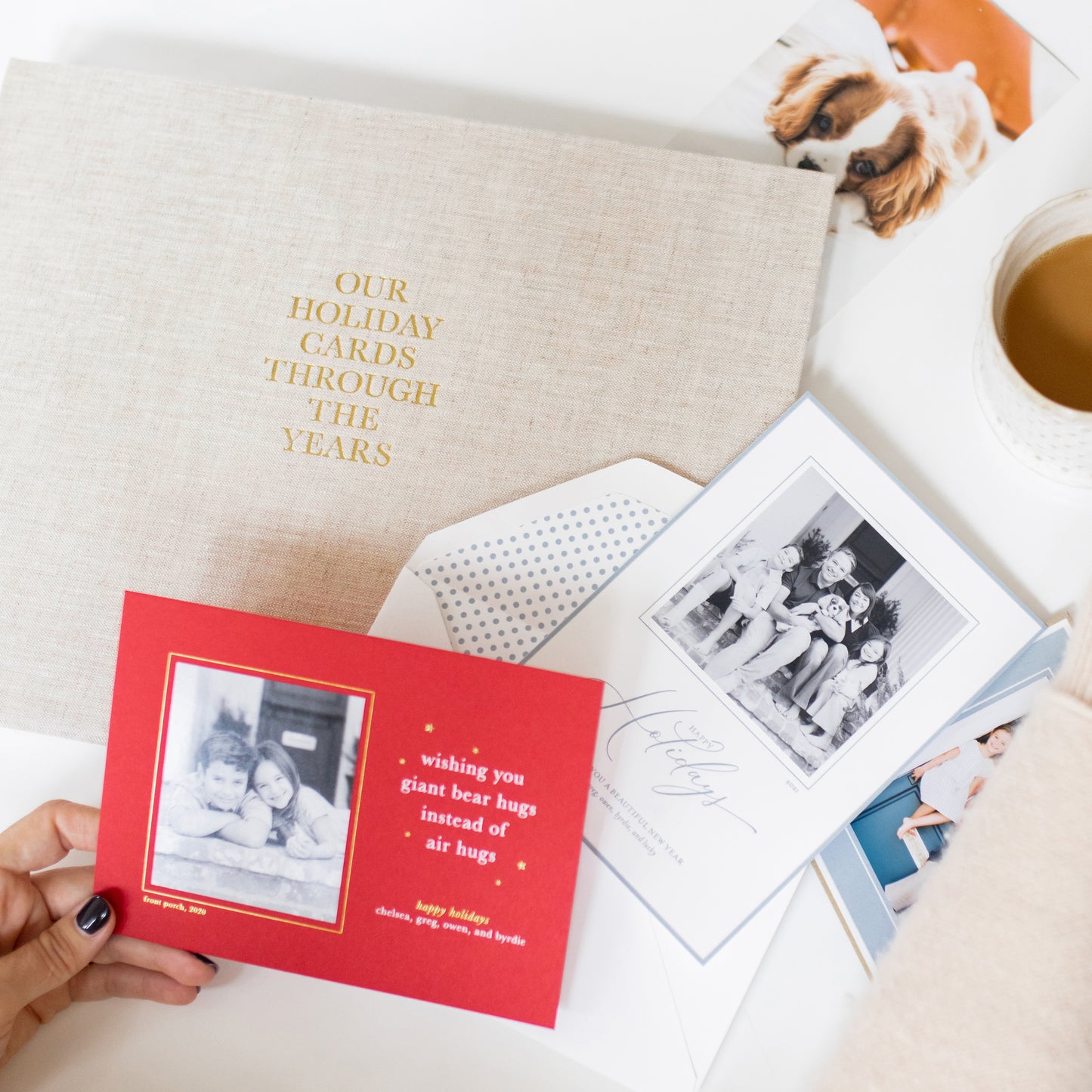 the holiday card book with several loose cards