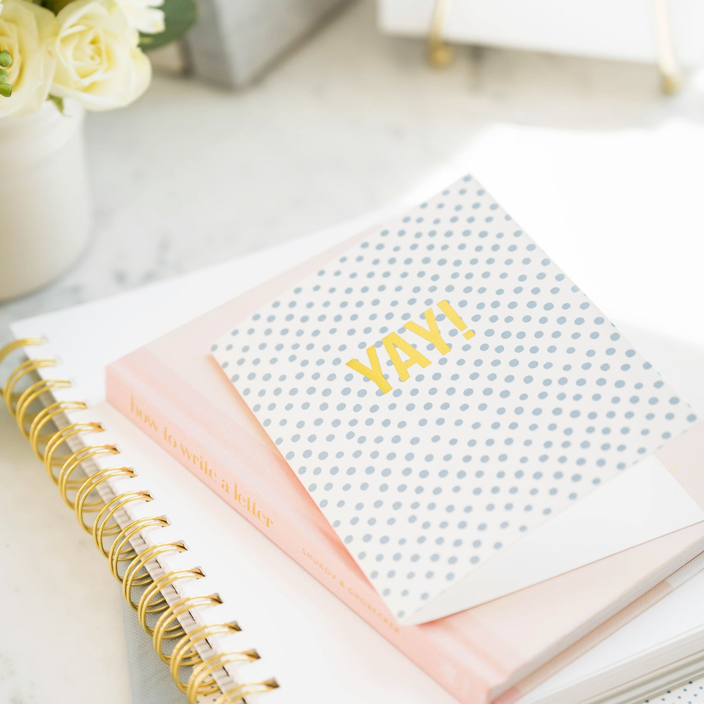 yay card on book and notebook