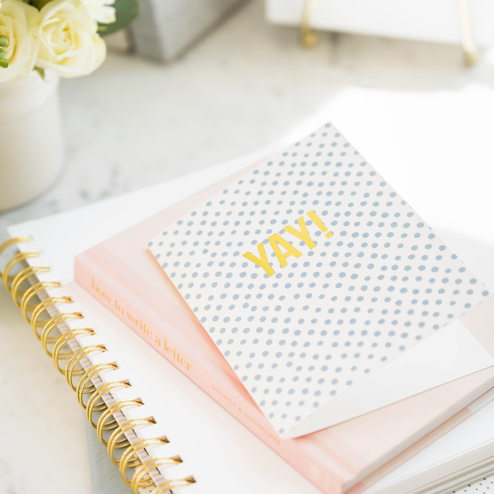 yay card on book and notebook