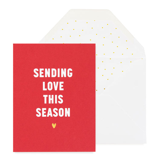 red card with white and gold foil text, white envelope with gold scattered dot liner