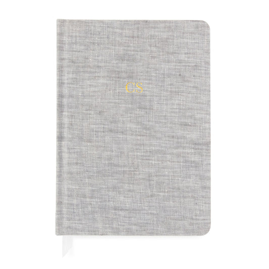 Grey fabric journal with gold foil monogram on cover