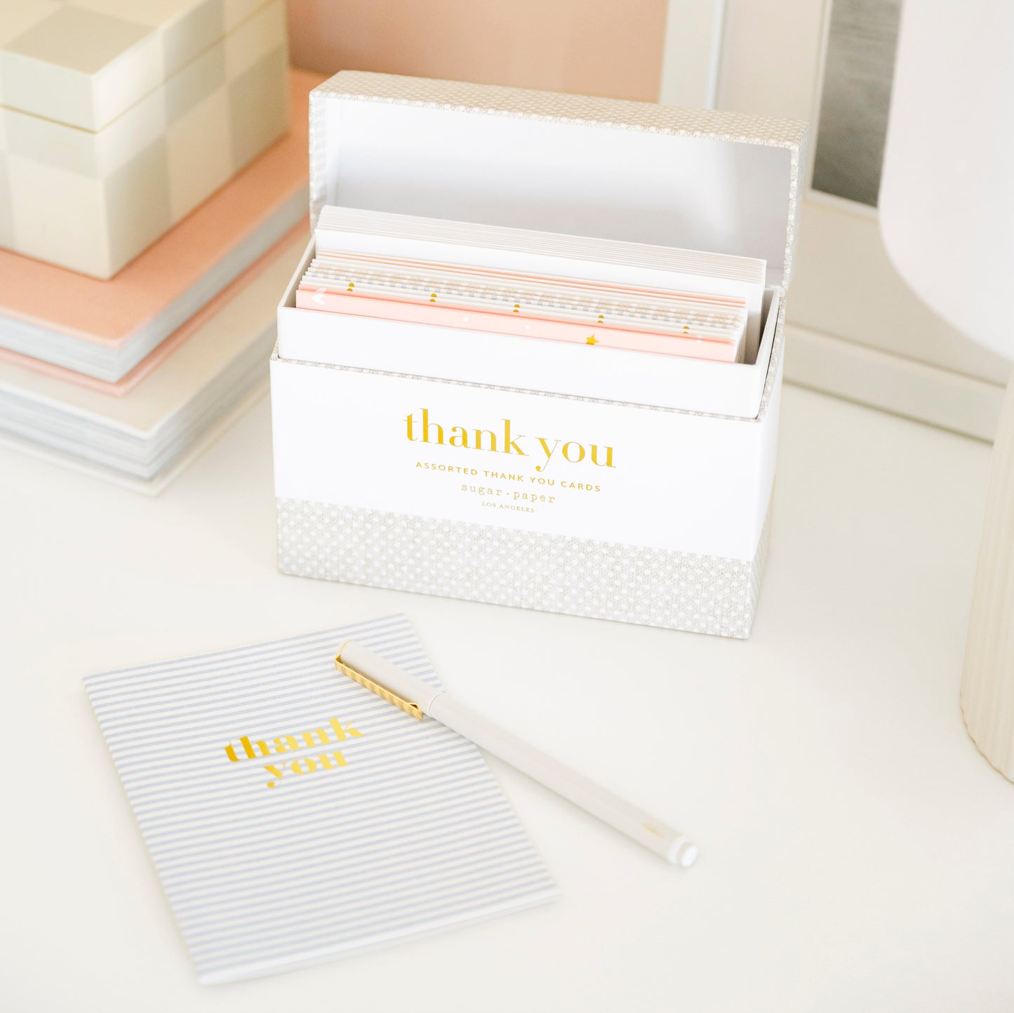 thank you box on desk with pen