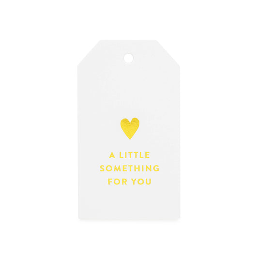 white tag with heart and a little something for you printed in gold