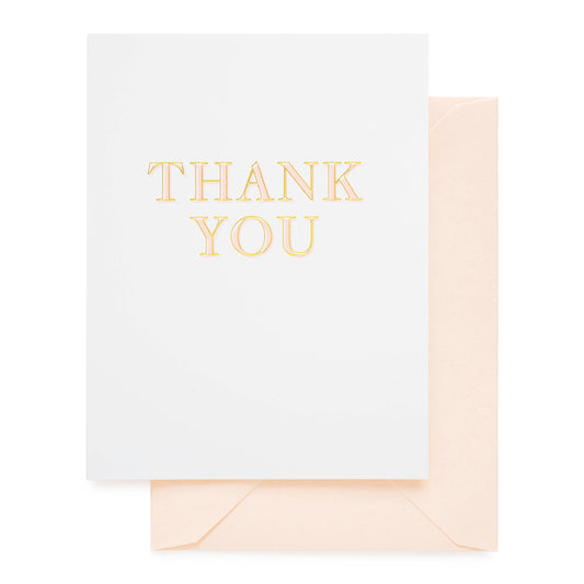 Etched pink and gold foil thank you card printed on white paper with a pink envelope