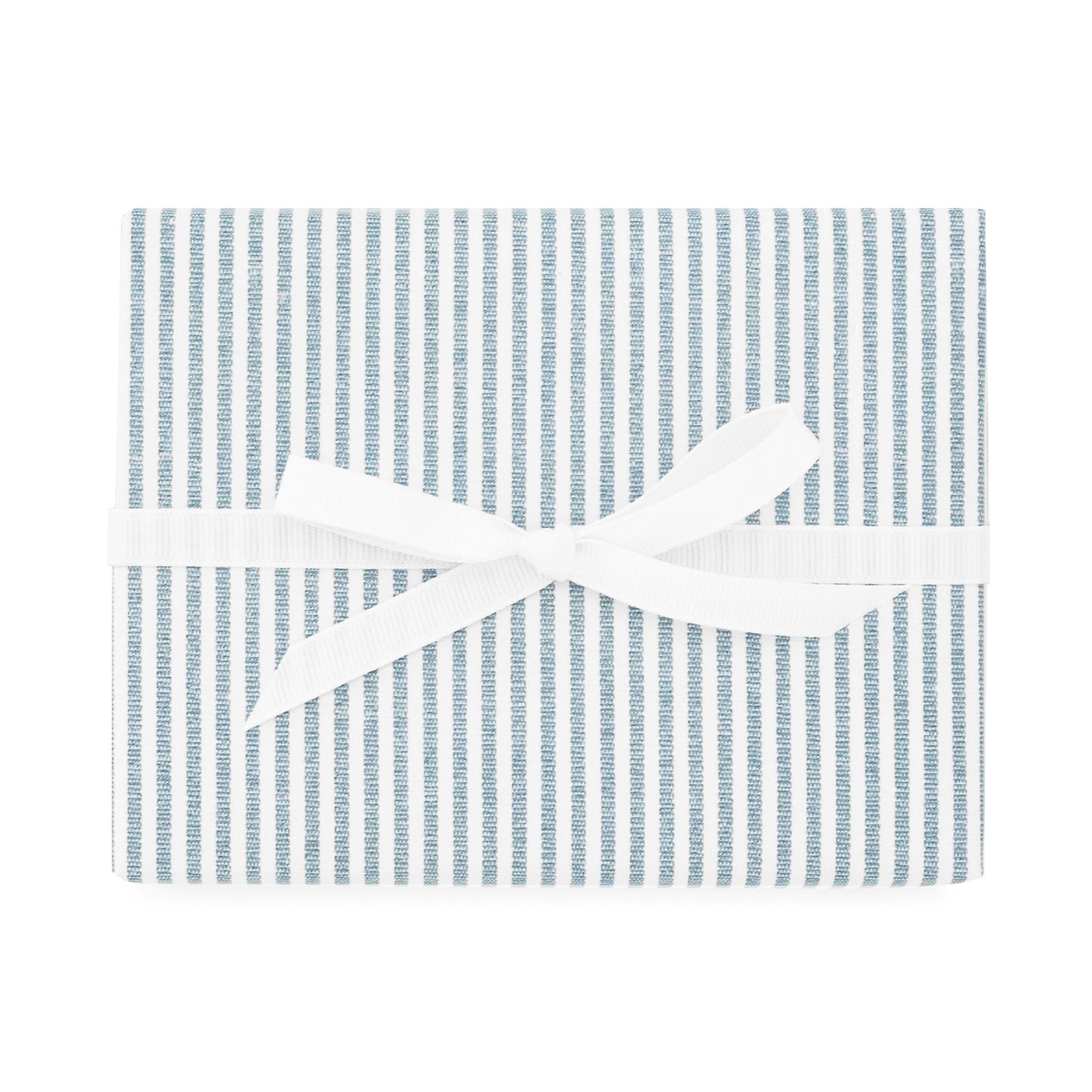 gift wrapped with navy ticking stripe wrapping paper