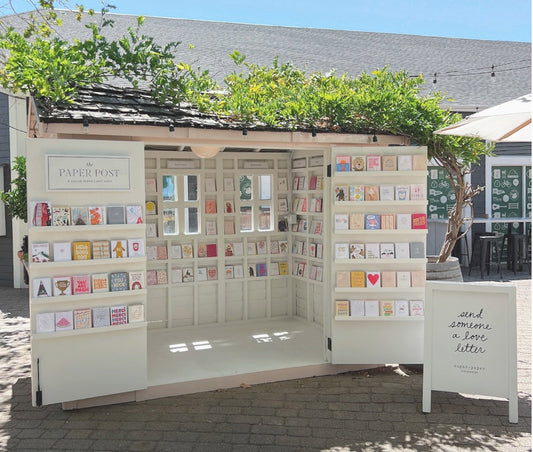 paper post pop up store with greeting cards on display
