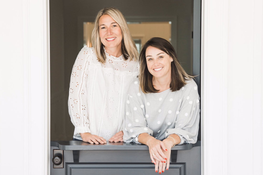 Sugar Paper founders Jamie Grobecker and Chelsea Shukov in door frame
