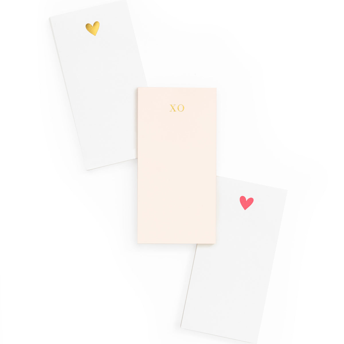 everyday pads with gold heart, pink xo and neon pink heart