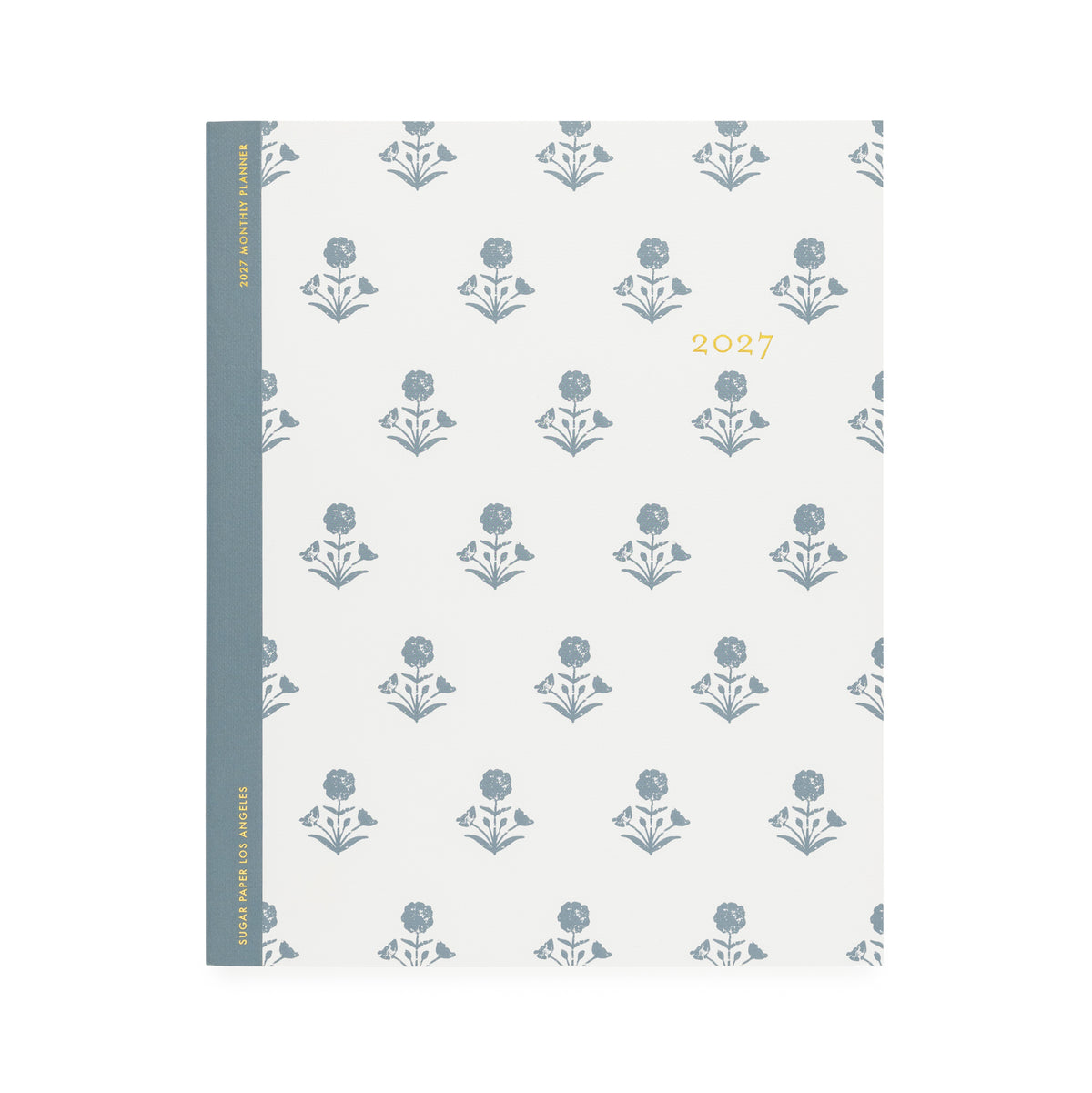 A white flat monthly planner with a dusty blue floral pattern with '2027' stamped on cover in gold foil with a dusty blue tape binding