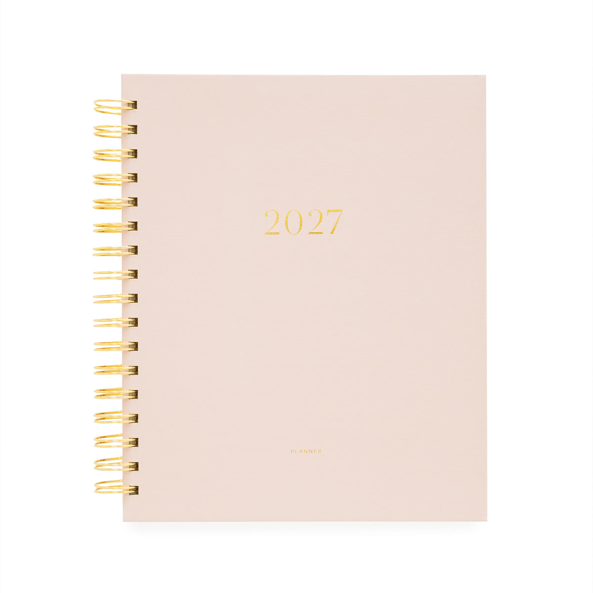 A 2027 spiral-bound planner with a pale blush pink cover and gold foil lettering, bound with a gold wire coil and '2027' and 'planner' foil stamped on the cover