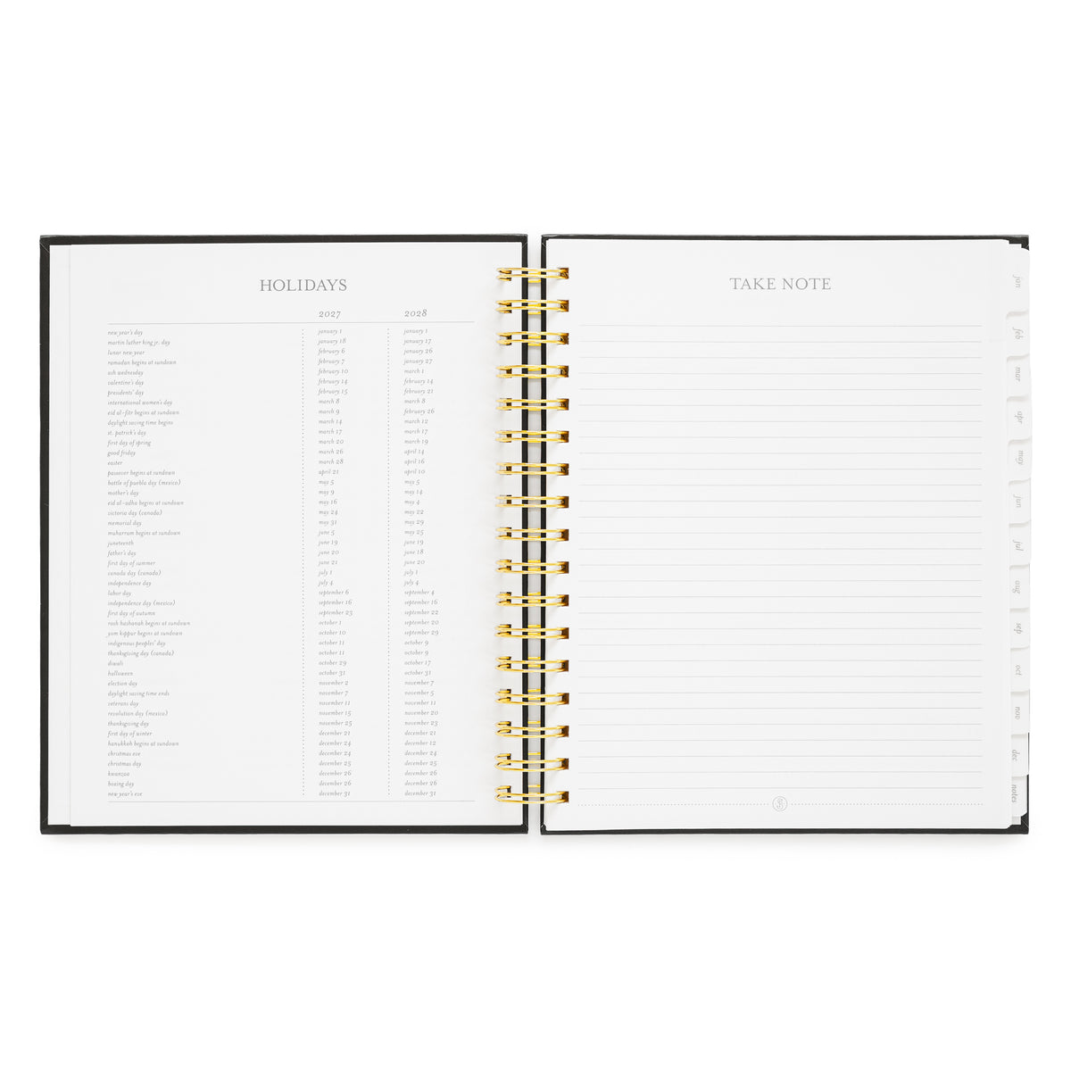 An open spiral-bound planner with a black cover, gold wire binding, and white pages. The left page is headed 'HOLIDAYS' with a list of all the holidays for 2027 and 2028, and the right page is headed 'TAKE NOTE' with lined writing space