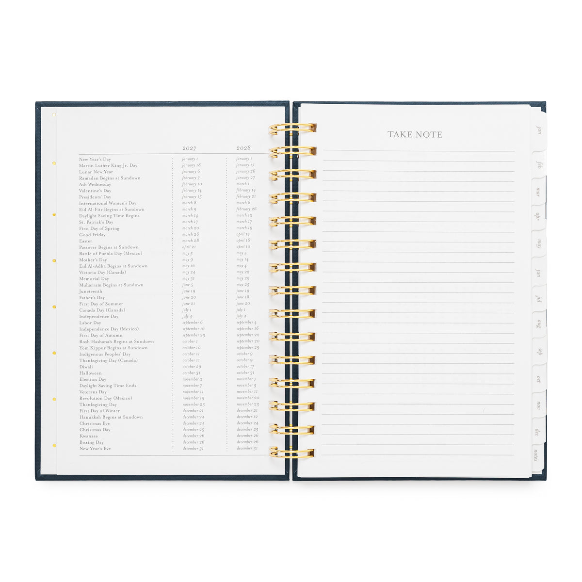 An open spiral-bound planner showing two interior pages: a left page with a dense list of holiday dates for 2027 + 2028, and a right page with a lined 'TAKE NOTE' section.