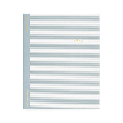 Dusty blue and white stripe monthly planner foil stamped in gold with 2025 on the cover
