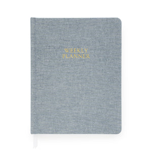 Chambray blue weekly planner foil stamped with weekly planner in gold on cover
