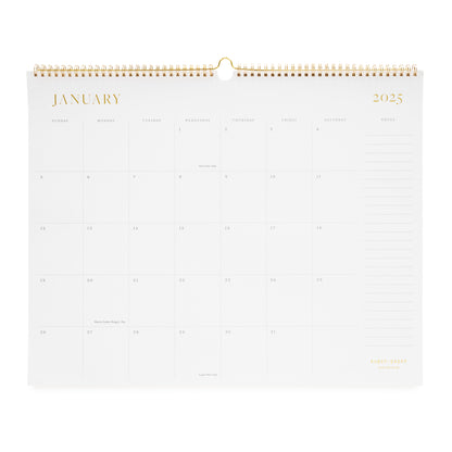 2025 wall calendar with gold spiral binding and gold foil details