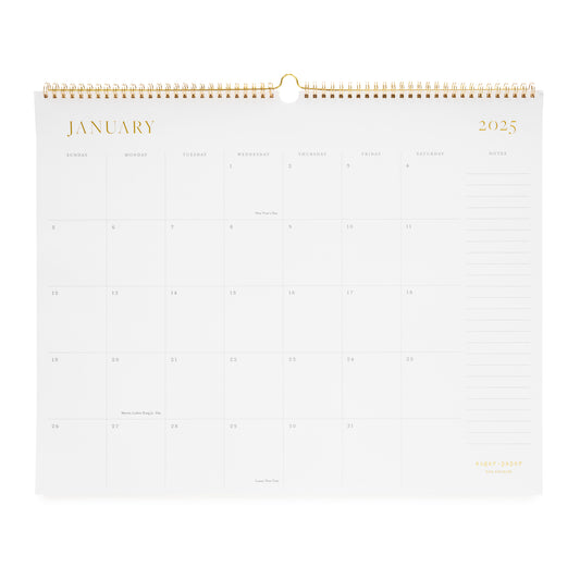 2025 wall calendar with gold spiral binding and gold foil details