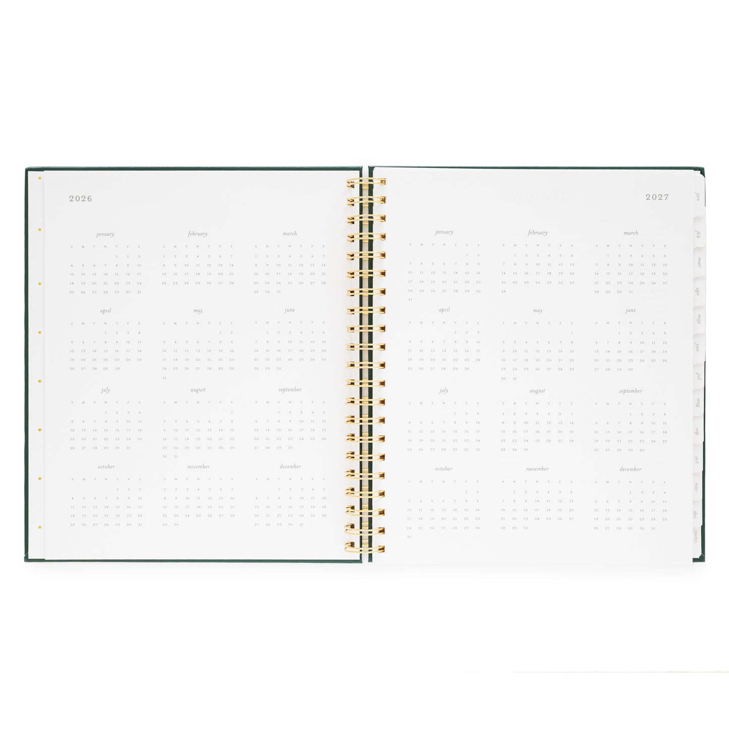 Open large weekly spiral planner with 2026 + 2027 month overview