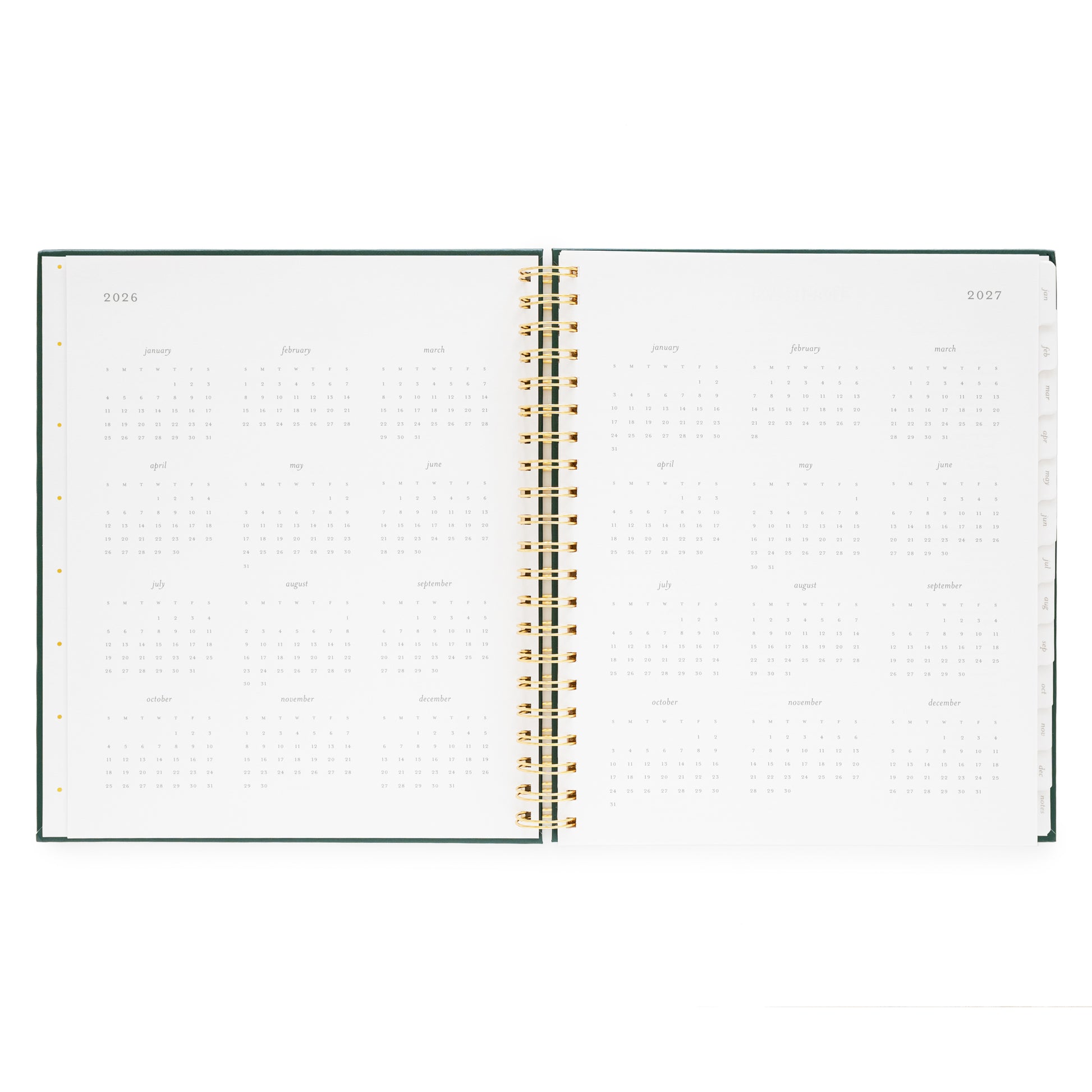 Open large weekly spiral planner with 2026 + 2027 month overview