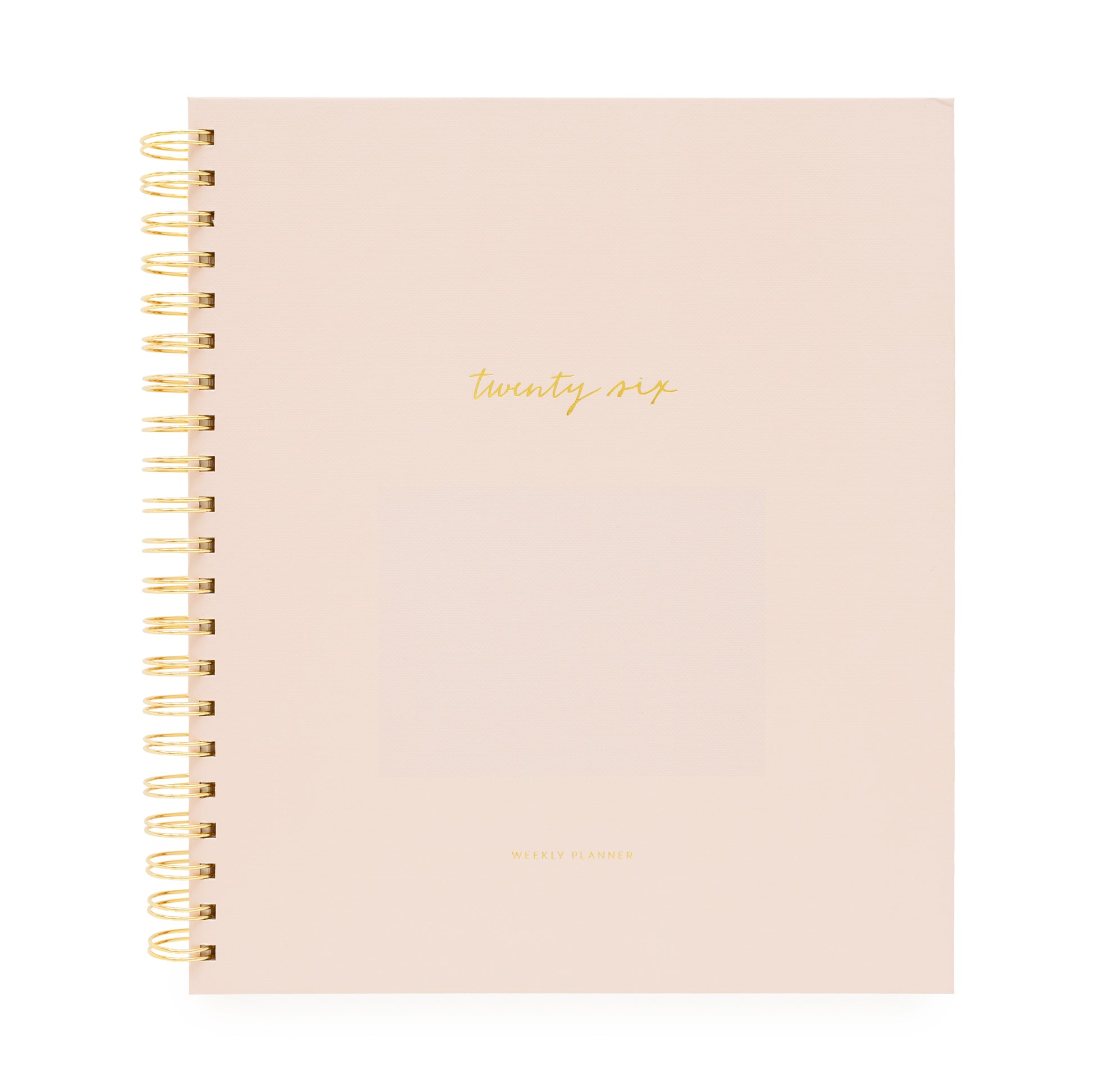 Blush planner with gold spiral binding and 'twenty-six' on cover