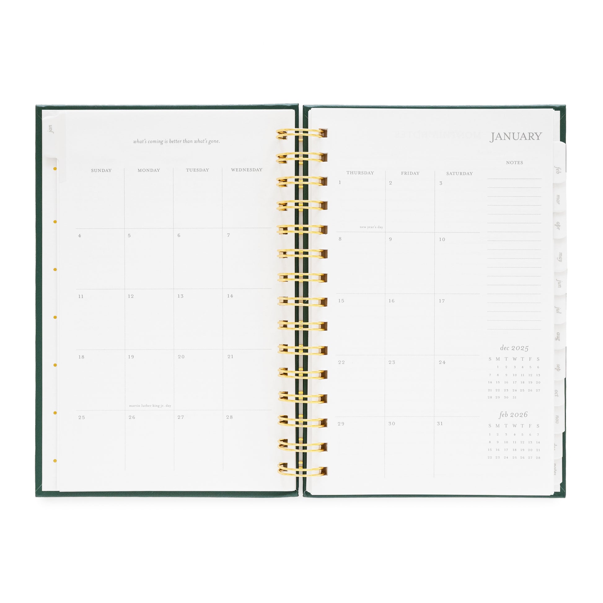 Open small spiral planner showing a monthly calendar layout for January 2026