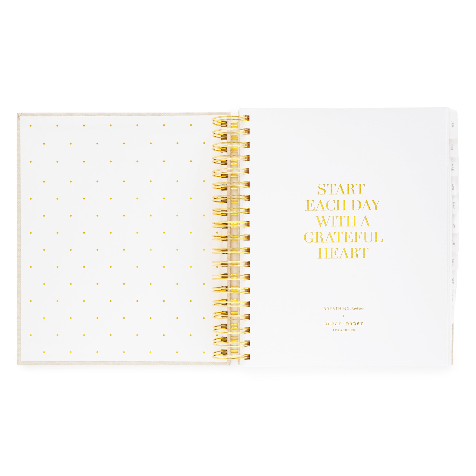 Daily spiral planner with gold spiral binding and 'Start Each Day With A Grateful Heart' in gold foil