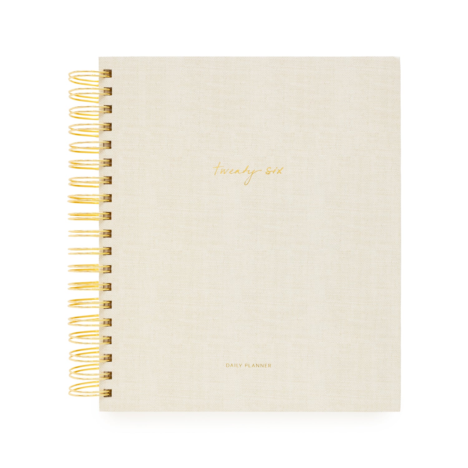 Beige planner with gold spiral binding and 'Twenty Six and Daily Planner' in gold foil}