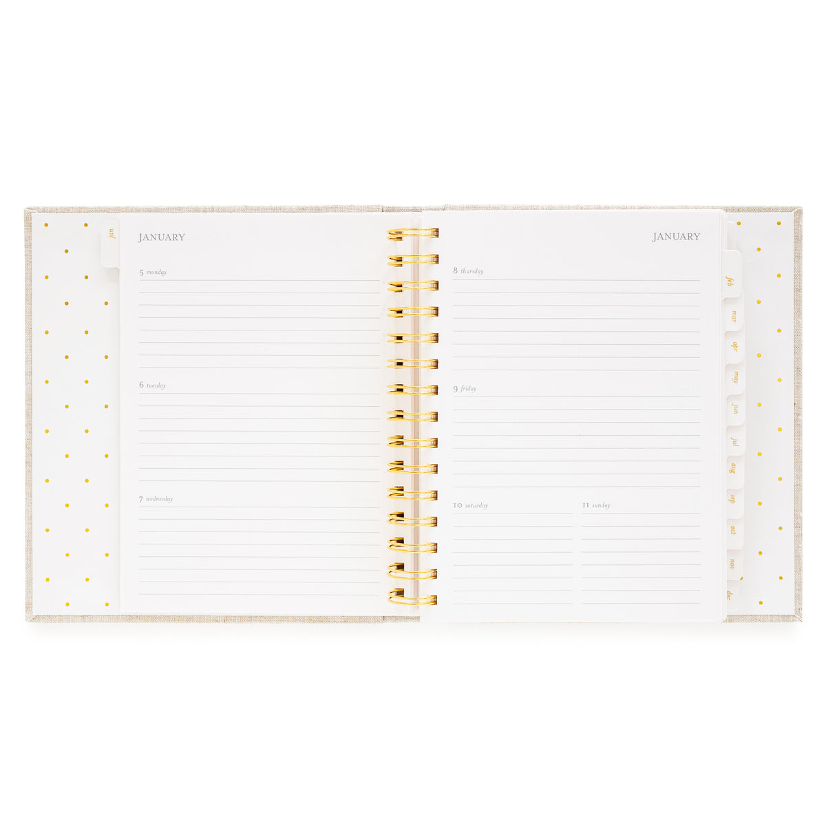 An open concealed agenda with gold spiral with weekly planning pages