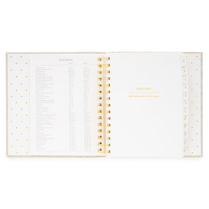 Open 2026 concealed planner with 2026 + 2027 holidays and january title page