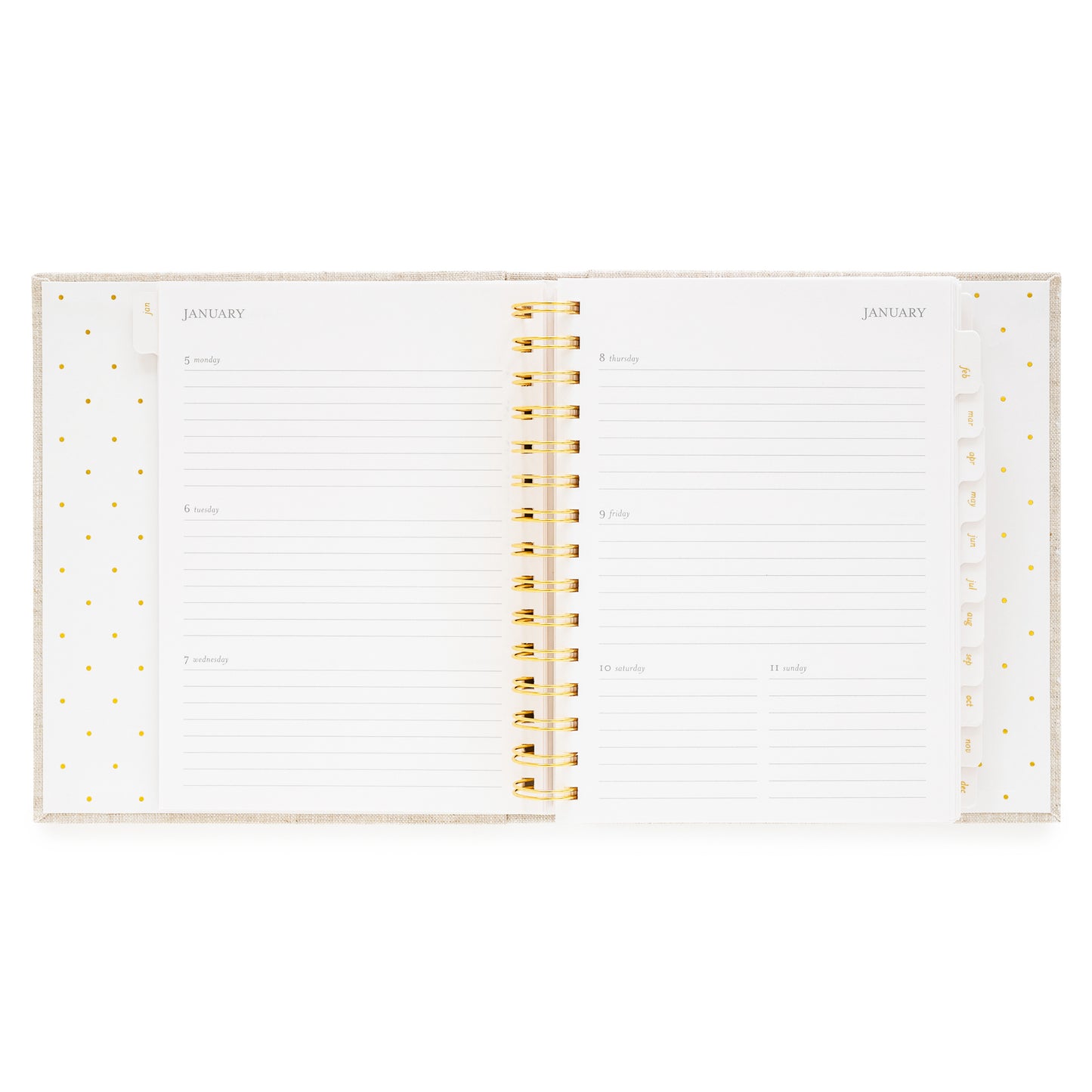 Open concealed agenda with gold spiral to weekly layout with space for each day of the week