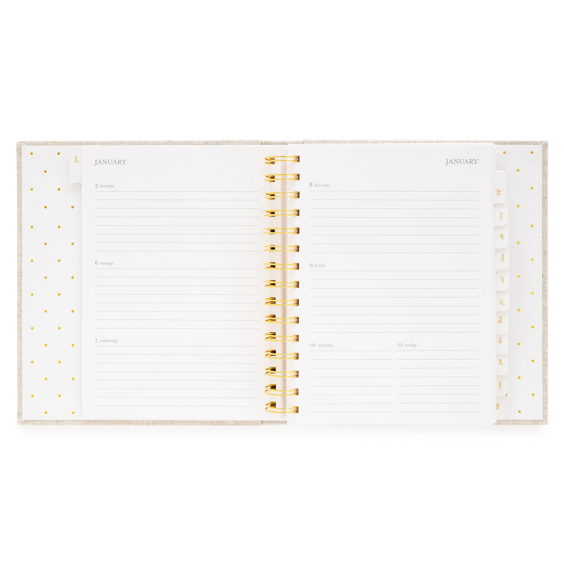Open concealed agenda with gold spiral to weekly layout with space for each day of the week