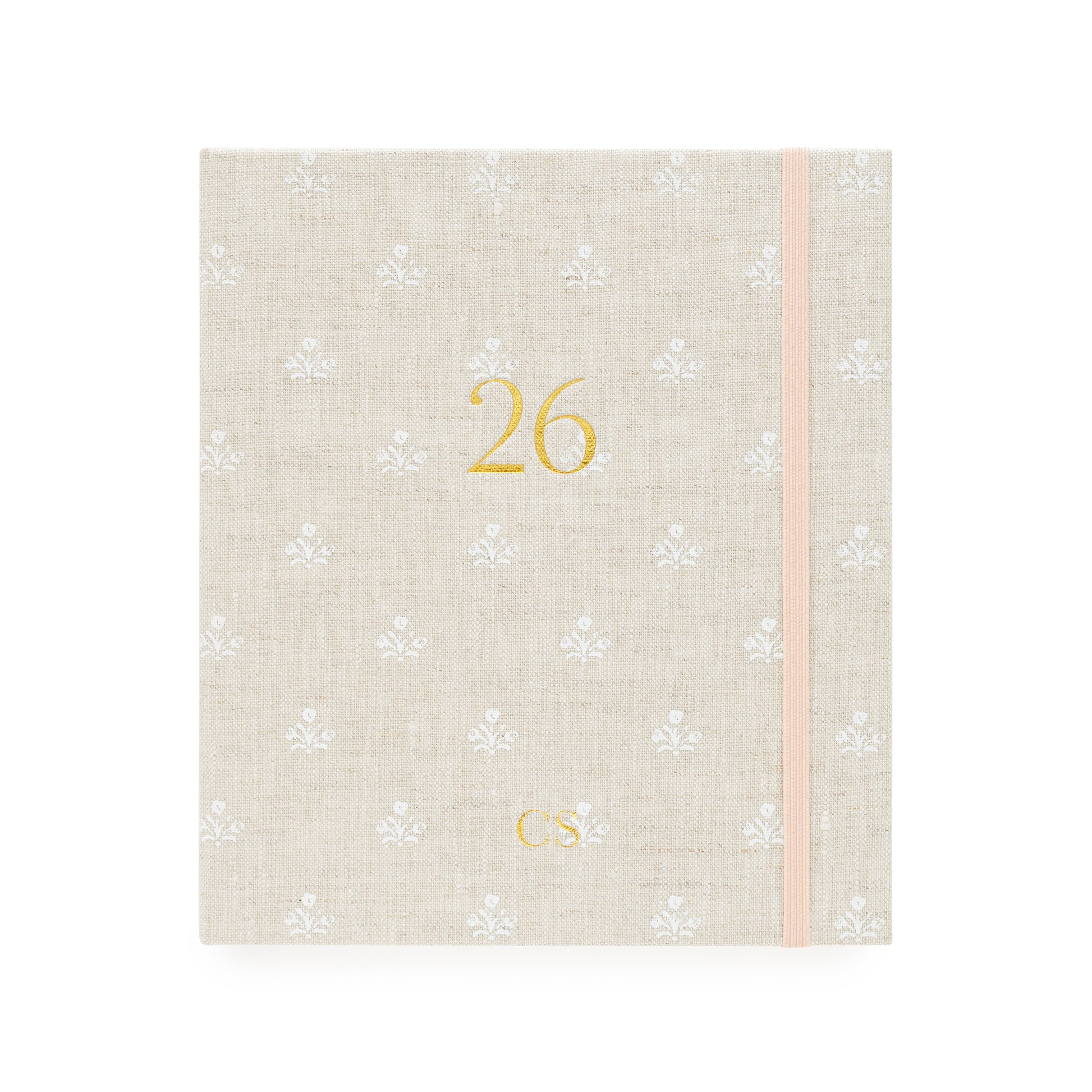 2026 fabric planner with beige and white floral pattern and '26' and 'cs' initials stamped in gold foil