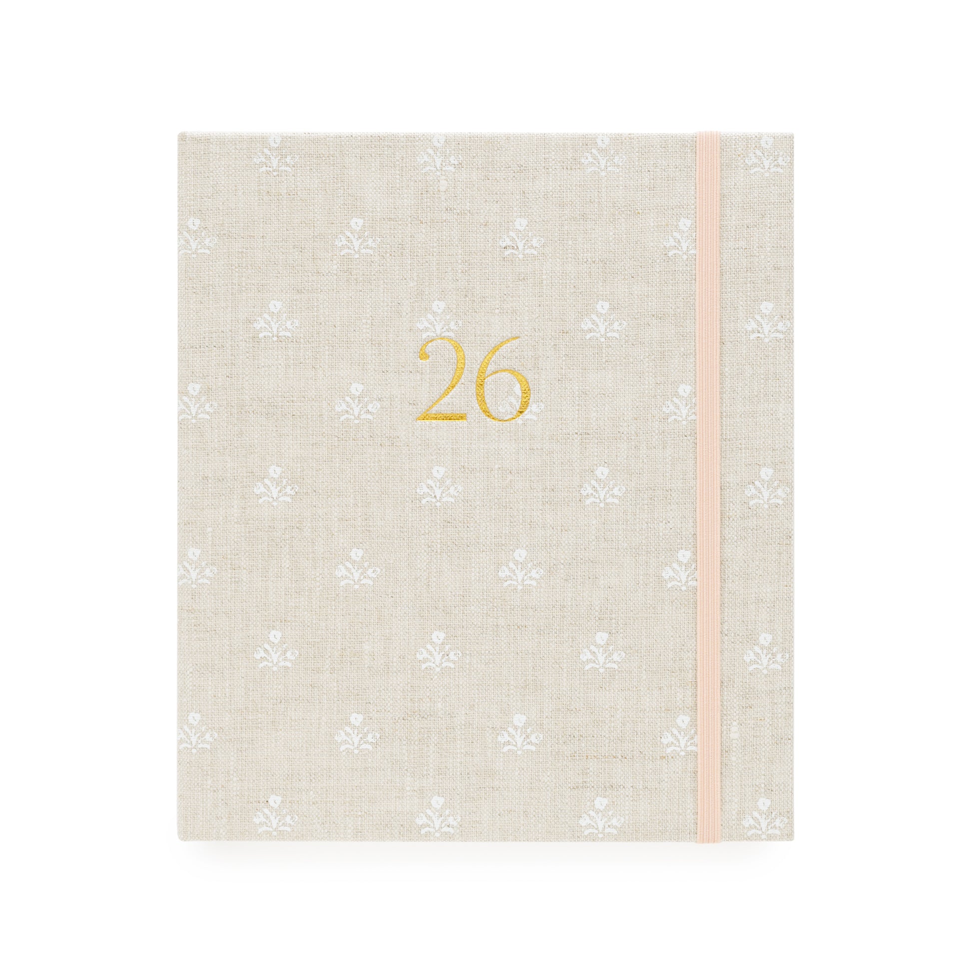 Beige and white floral pattern fabric planner with the gold foil 26 on the cover
