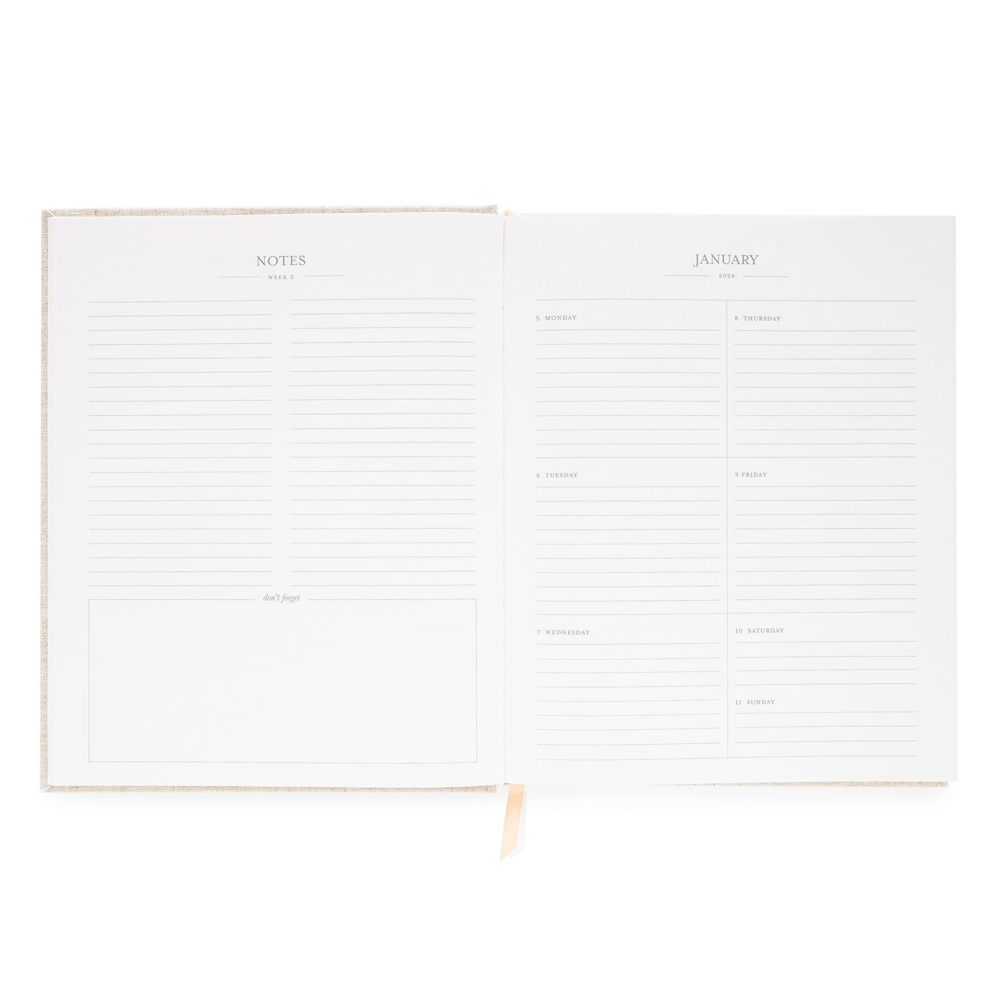 Interior of desk agenda with notes, dont' forget and weekly layout for january 2026 with space for each day of the week