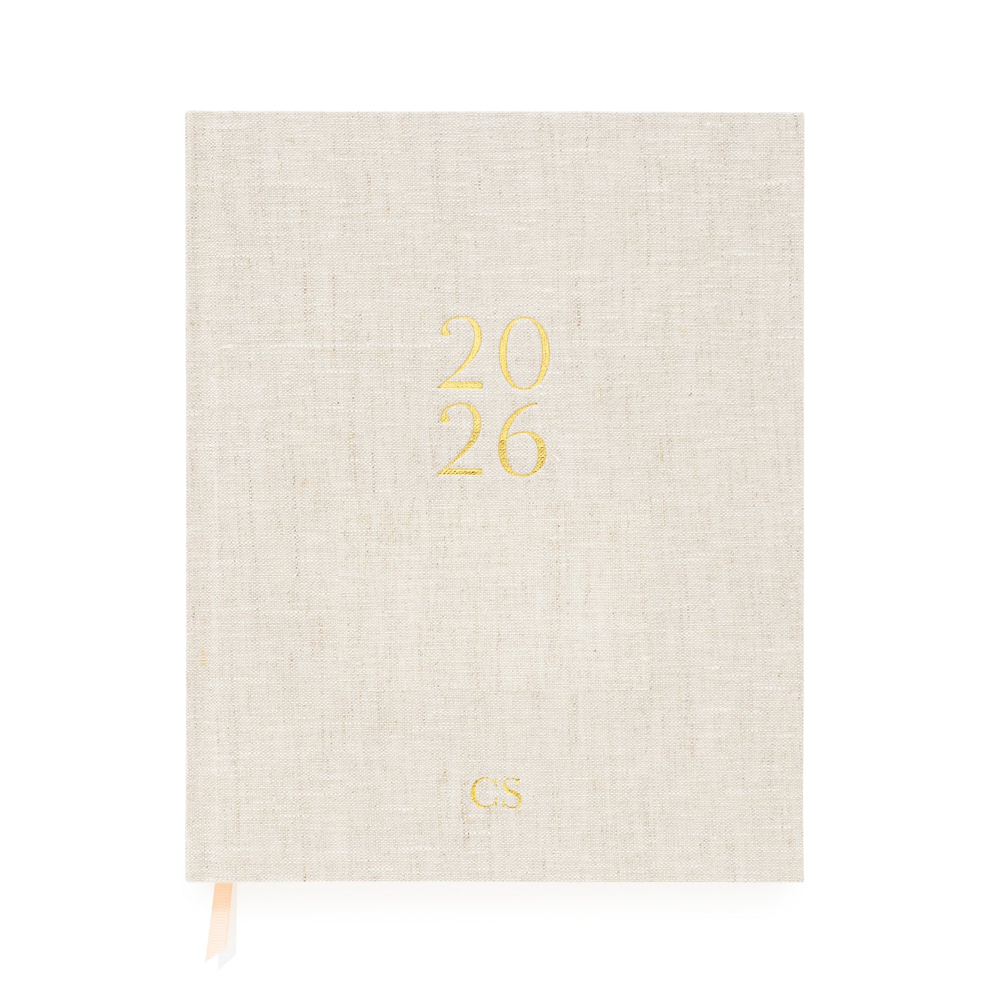 Flax desk agenda cover foil stamped with 2026 in gold foil with gold 'CS' initials and pink and white ribbon markers
