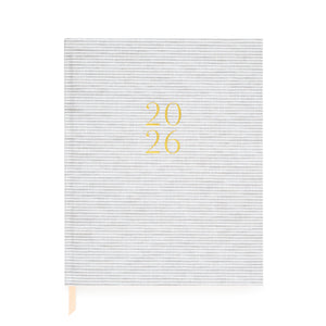Grey stripe fabric planner with 2026 stamped in foil on cover