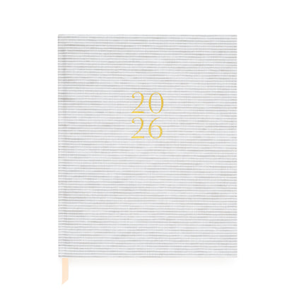 Grey stripe fabric planner with 2026 stamped in foil on cover
