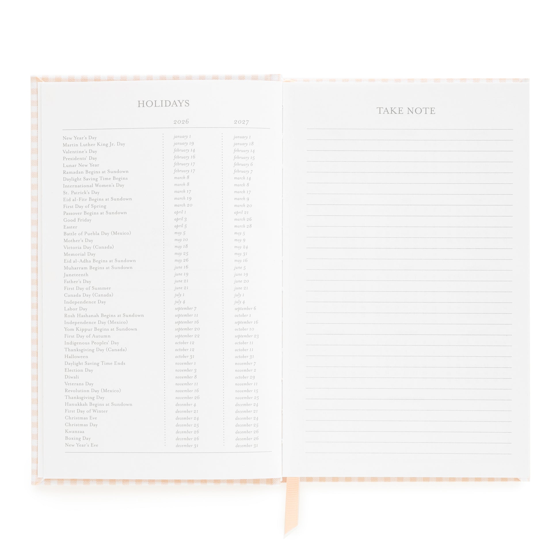 Open small bound agenda with 2026 + 2027 holidays and take note section with ruled lines