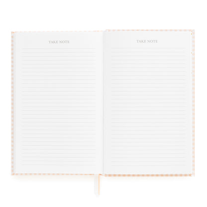 Open small bound agenda with two pages of take notes pages with ruled lines