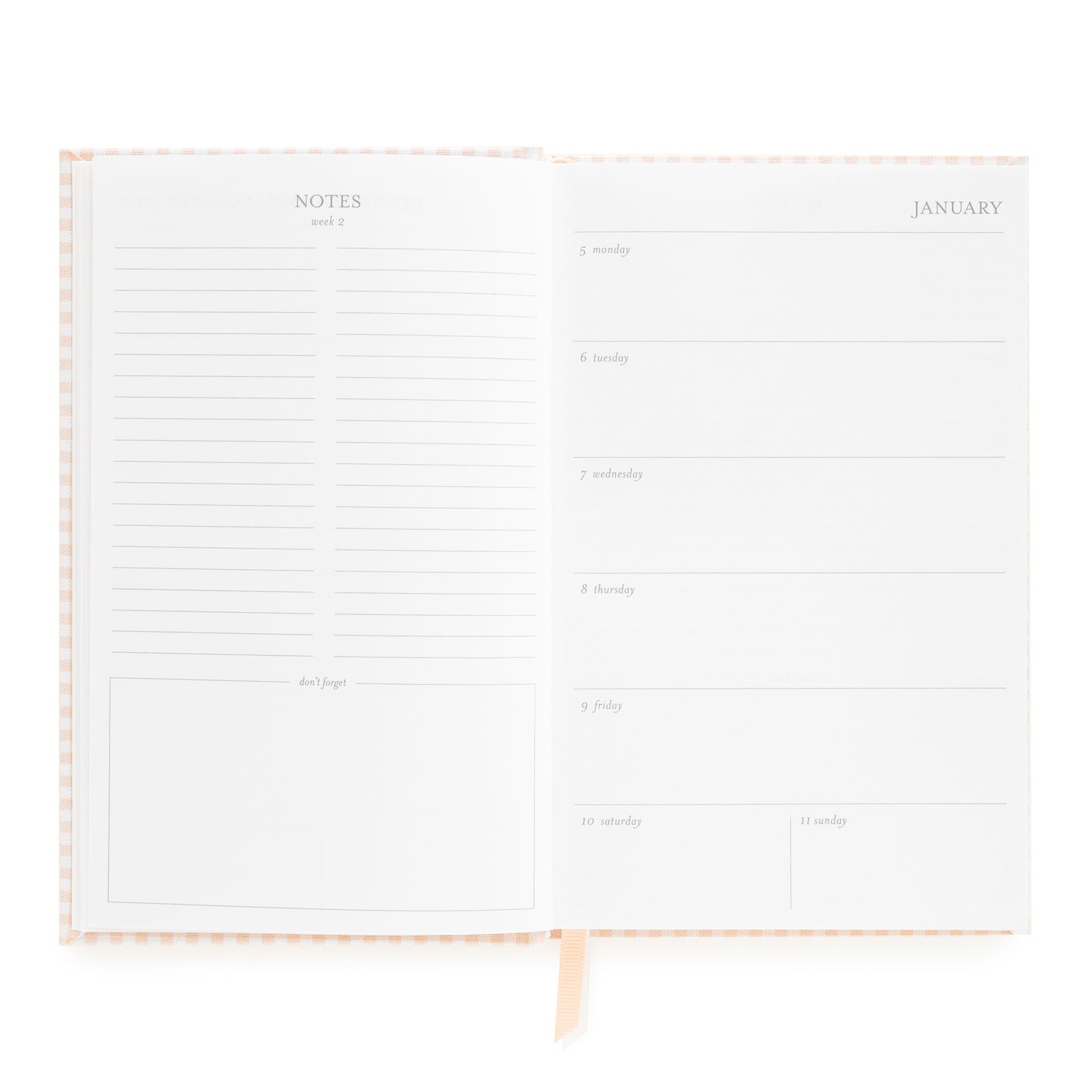 Open small bound agenda with weekly notes page and weekly space for each day of the week