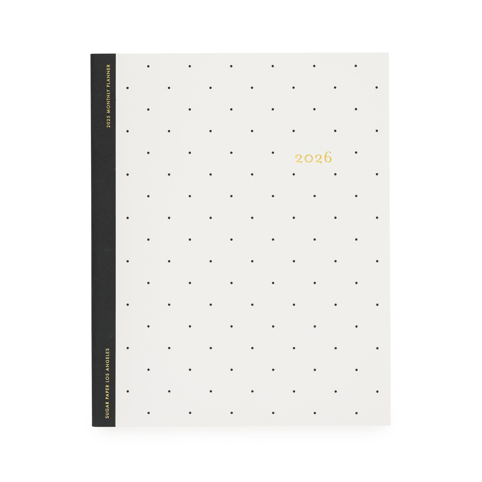 White planner with black dot pattern and '2026' gold foil on cover