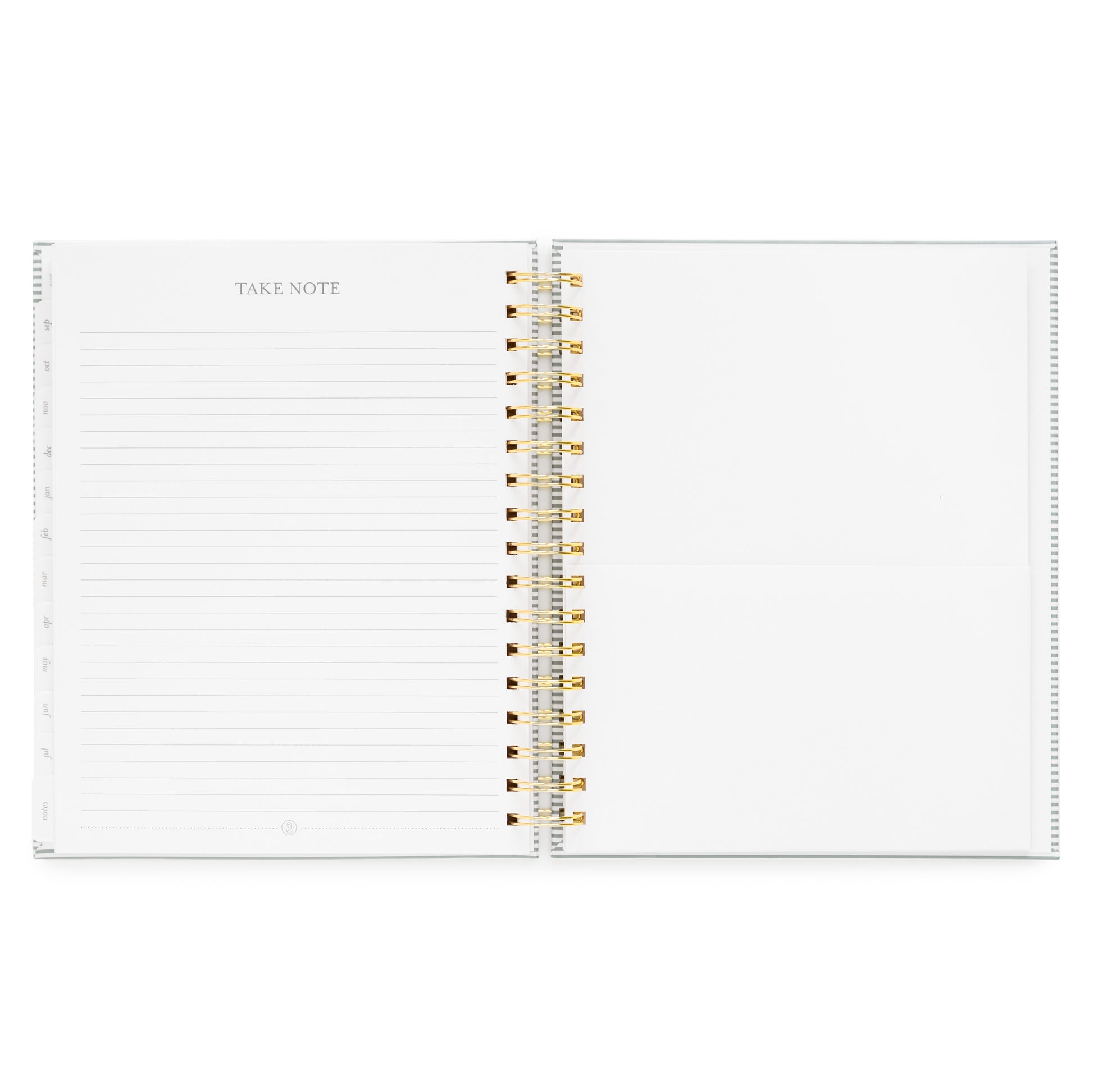 Open spiral planner with take note section with ruled lines on the left and a pocket on the right