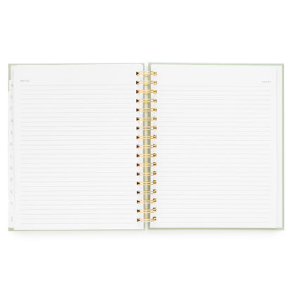Open notes pages of academic spiral planner
