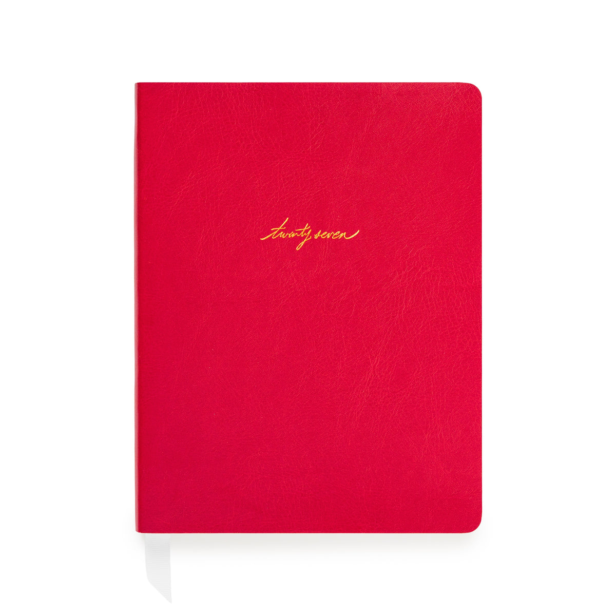 A red soft leather planner with gold foil script reading 'twenty-seven' on the front cover with white ribbon markers