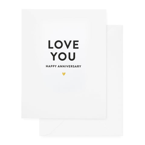 white card with black text and gold heart, white envelope
